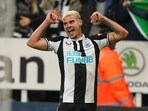 Newcastle United's Bruno Guimaraes celebrates scoring during the English Premier League soccer match at St. James' Park, Newcastle upon Tyne, England, Monday May 16, 2022.(AP)