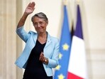 Newly-appointed French Prime Minister Elisabeth Borne gestures as she attends a handover ceremony in the courtyard of Hotel Matignon in Paris, France.(REUTERS)