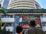People watch the Sensex on a screen outside Bombay Stock Exchange (BSE) in Mumbai. (PTI File Photo) People watch the Sensex on a screen outside Bombay Stock Exchange (BSE) in Mumbai. (PTI File Photo)
