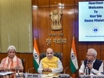 Union Home Minister Amit Shah with J & K Lieutenant Governor Manoj Sinha and Home Secretary Ajay Kumar Bhalla at a meeting on security preparedness for 'Amarnath Yatra', in New Delhi.(PTI) Union Home Minister Amit Shah with J & K Lieutenant Governor Manoj Sinha and Home Secretary Ajay Kumar Bhalla at a meeting on security preparedness for 'Amarnath Yatra', in New Delhi.(PTI)