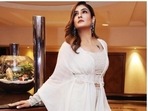 Raveena Tandon’s fashion diaries are a treat for sore eyes. Raveena keeps slaying fashion goals like a diva. A day back, the actor shared a slew of pictures from one of her recent fashion photoshoots on her Instagram profile and made her fans swoon. For the pictures, Raveena chose to opt for an all-white ensemble.(Instagram/@officialraveenatandon)