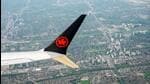 An Air Canada plane is seen in the air after departing from Pearson International Airport in Toronto, Ontario, Canada, on Monday. (REUTERS)