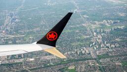 An Air Canada plane is seen in the air after departing from Pearson International Airport in Toronto, Ontario, Canada, on Monday. (REUTERS)