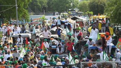 Farmers protest near Chandigarh-Mohali border after being stopped from heading towards Chandigarh, in Mohali on Tuesday. (PTI) Farmers protest near Chandigarh-Mohali border after being stopped from heading towards Chandigarh, in Mohali on Tuesday. (PTI)