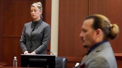 Actors Amber Heard and Johnny Depp watch as the jury leaves the courtroom at the end of the day at the Fairfax County Circuit Courthouse in Fairfax on Monday. (AP) (AP) Actors Amber Heard and Johnny Depp watch as the jury leaves the courtroom at the end of the day at the Fairfax County Circuit Courthouse in Fairfax on Monday. (AP) (AP)