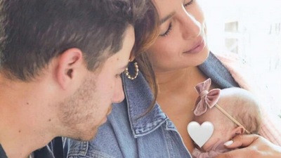 Priyanka Chopra and Nick Jonas with their daughter Malti. Priyanka Chopra and Nick Jonas with their daughter Malti.