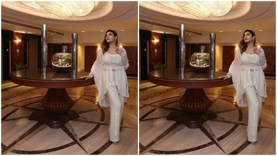Styled by fashion stylist Surina Kakkar, Raveena wore her tresses open in wavy curls with a side part as she posed for the indoor photoshoot. (Instagram/@officialraveenatandon)