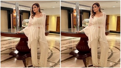 Raveena, assisted by makeup artist Shura Bhavin, decked up in nude eyeshadow, black eyeliner, mascara-laden eyelashes, black kohl, drawn eyebrows, contoured cheeks and a shade of orange lipstick. (Instagram/@officialraveenatandon)