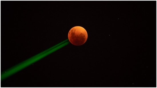 In Santiago, the moon entered the lunar eclipse.(AFP)