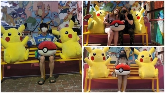 Fans recreate Jin's picture on Pokemon-themed bench.