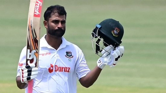 Bangladesh's Tamim Iqbal celebrates after scoring a century against Sri Lanka.&nbsp;(AFP)