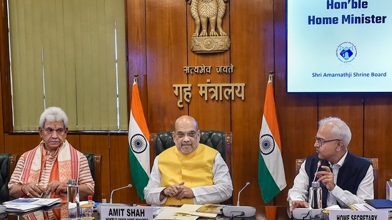 Union Home Minister Amit Shah with J &amp; K Lieutenant Governor Manoj Sinha and Home Secretary Ajay Kumar Bhalla at a meeting on security preparedness for 'Amarnath Yatra', in New Delhi.(PTI)