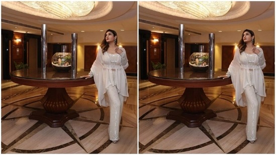 Styled by fashion stylist Surina Kakkar, Raveena wore her tresses open in wavy curls with a side part as she posed for the indoor photoshoot.(Instagram/@officialraveenatandon)
