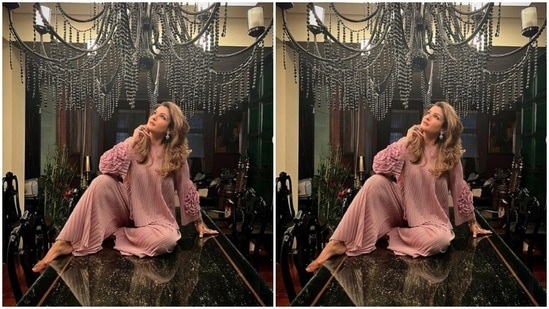 Raveena, a few days back, shared a set of pictures in a pastel pink satin co-ord set that gave us all the cues of summer fashion we need.(Instagram/@officialraveenatandon)