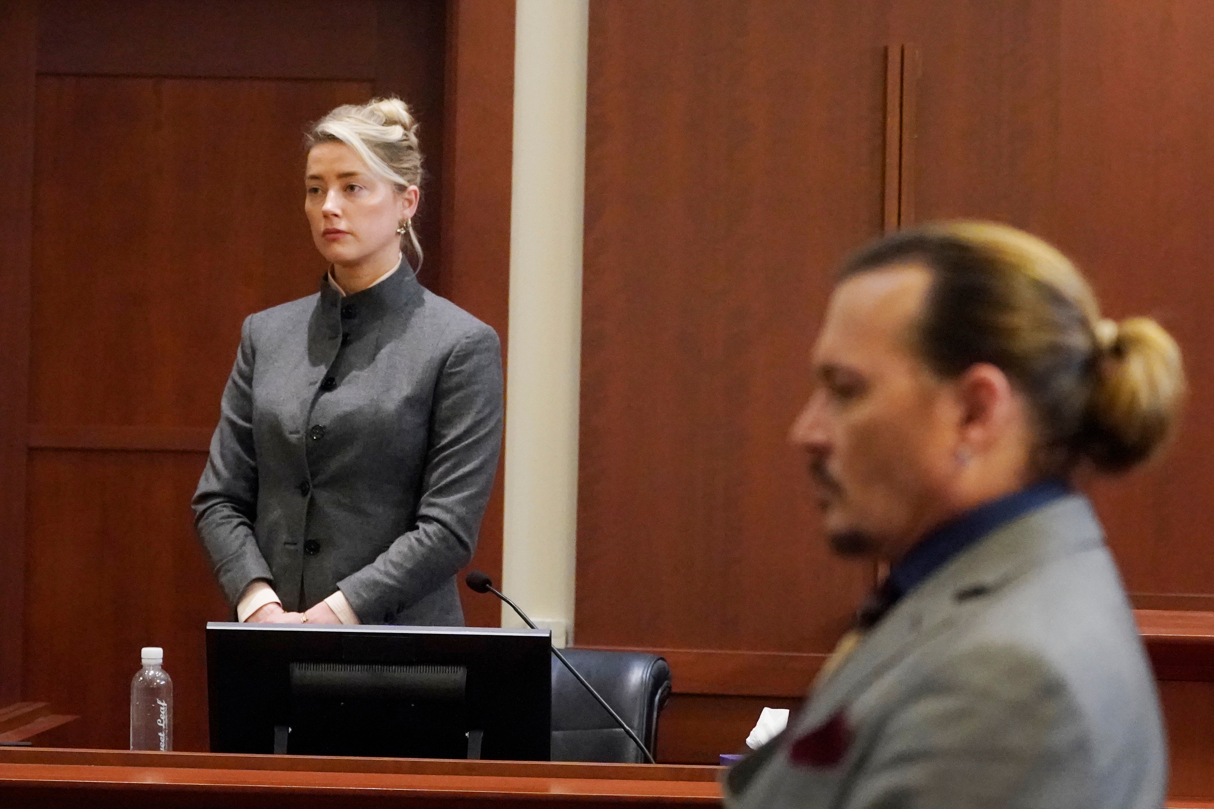 Actors Amber Heard and Johnny Depp watch as the jury leaves the courtroom at a court in the US. (AP) Actors Amber Heard and Johnny Depp watch as the jury leaves the courtroom at a court in the US. (AP)