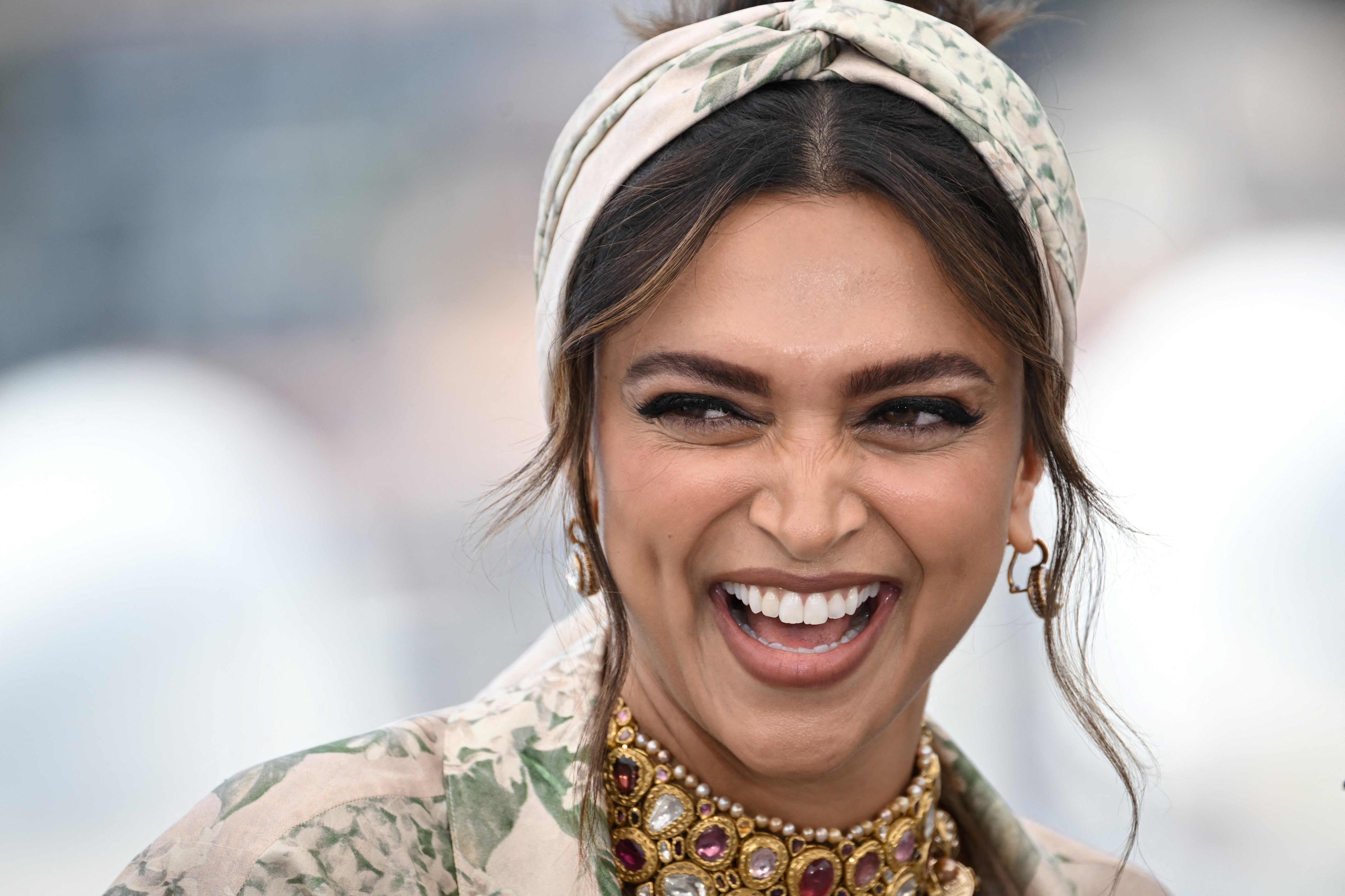 Indian actress and member of the Jury of the Official Selection Deepika Padukone laughs during a photocall of the Jury at the 75th edition of the Cannes Film Festival in Cannes, southern France, on May 17, 2022. (Photo by LOIC VENANCE / AFP) (AFP) Indian actress and member of the Jury of the Official Selection Deepika Padukone laughs during a photocall of the Jury at the 75th edition of the Cannes Film Festival in Cannes, southern France, on May 17, 2022. (Photo by LOIC VENANCE / AFP) (AFP)