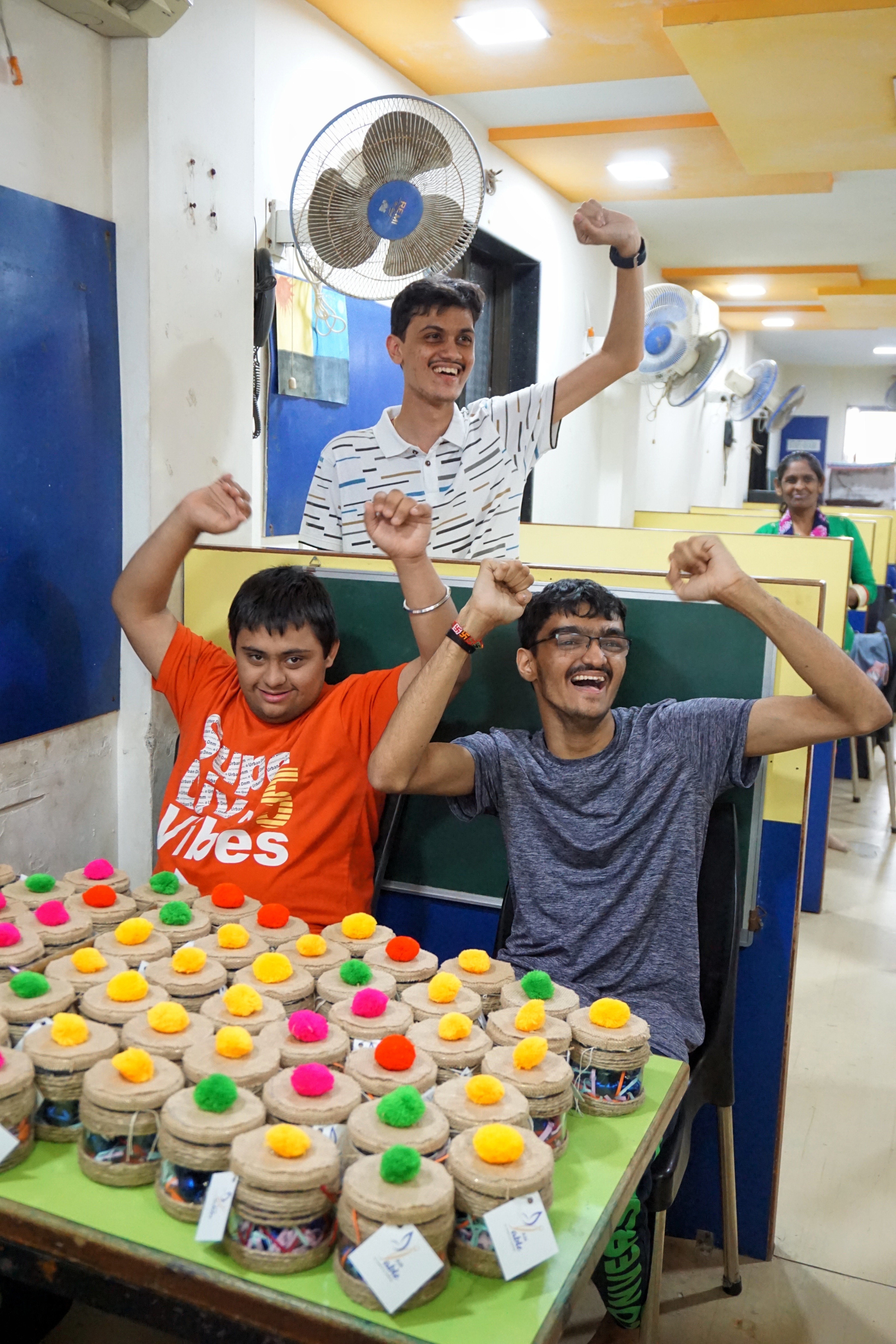 Some happy members of I AM ABLE with a bulk order of handcrafted jars they made. Some happy members of I AM ABLE with a bulk order of handcrafted jars they made.