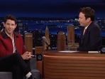 Nick Jonas with Jimmy Fallon on his show. Nick Jonas with Jimmy Fallon on his show.