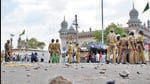 Policemen stand guard at the site of a blast in front of Mecca Masjid, the main mosque in the southern Indian city of Hyderabad. (REUTERS)