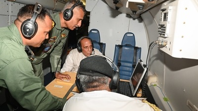 Defence Minister Rajnath Singh rides P8I long range maritime reconnaissance anti-submarine warfare aircraft of the Indian Navy during his visit to Mumbai. (PTI) Defence Minister Rajnath Singh rides P8I long range maritime reconnaissance anti-submarine warfare aircraft of the Indian Navy during his visit to Mumbai. (PTI)
