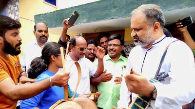 AG Perarivalan, a convict in the Rajiv Gandhi assassination case, plays a musical instrument to celebrate the SC verdict outside his house in Jolarpet, Tirupattur district of Tamil Nadu, on Wednesday. (PTI) AG Perarivalan, a convict in the Rajiv Gandhi assassination case, plays a musical instrument to celebrate the SC verdict outside his house in Jolarpet, Tirupattur district of Tamil Nadu, on Wednesday. (PTI)