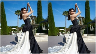Tamannaah’s gown featured halter neck and midriff-baring details. The gown featured bodycon details at the midriff and near to the waist, before becoming a cascading skirt with a dramatic white train. (Instagram/@tamannaahspeaks)