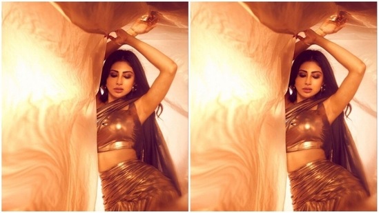 Mouni showed off her curves as she posed for a surreal photoshoot.(Instagram/@imouniroy)