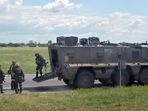 Russian servicemen are seen on a roadside in the Kherson region.(AFP) Russian servicemen are seen on a roadside in the Kherson region.(AFP)
