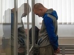 Russian soldier Vadim Shishimarin stands in court during a hearing in Kyiv, Ukraine, Thursday, May 19, 2022. (AP Photo/Roman Hrytsyna)