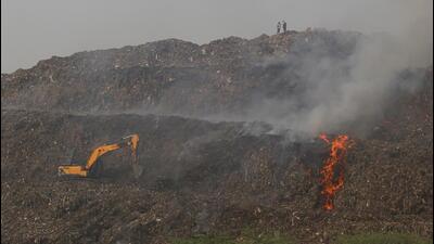 Fire fighting at Bhalswa landfill, on Thursday. (PTI) Fire fighting at Bhalswa landfill, on Thursday. (PTI)