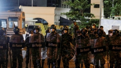 An image from April of Sri Lanka Air Force members guarding the Prime Minister's official residence, Temple Trees, amid the country's economic crisis, in Colombo. (REUTERS)