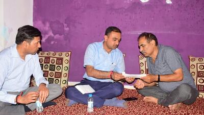 Jammu divisional commissioner Ramesh Kumar hands over the appointment letter and ex gratia amount to a family member of slain government employee Rahul Bhat in Jammu. (HT Photo) Jammu divisional commissioner Ramesh Kumar hands over the appointment letter and ex gratia amount to a family member of slain government employee Rahul Bhat in Jammu. (HT Photo)