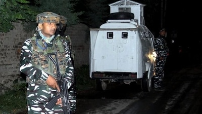 Security personnel cordoned off the area after a grenade attack on a wine shop in Baramulla on Tuesday. A burqa-clad terrorist walked up to a newly-opened shop, dropped a grenade inside through the porthole window, causing an explosion which killed one employee and left three others injured (PTI) Security personnel cordoned off the area after a grenade attack on a wine shop in Baramulla on Tuesday. A burqa-clad terrorist walked up to a newly-opened shop, dropped a grenade inside through the porthole window, causing an explosion which killed one employee and left three others injured (PTI)