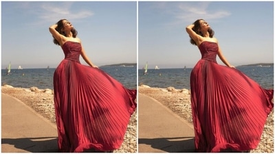 Hina Khan played muse to fashion designer house Rami Al Ali and picked a red dress for the pictures. (Instagram/@realhinakhan)