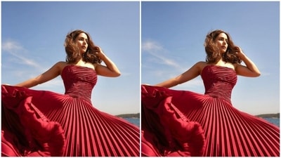 Hina’s off-shoulder dress came in multiple pleat details throughout. The dress hugged her shape and showed off her curves before becoming a cascading flowy skirt from the waist. (Instagram/@realhinakhan)