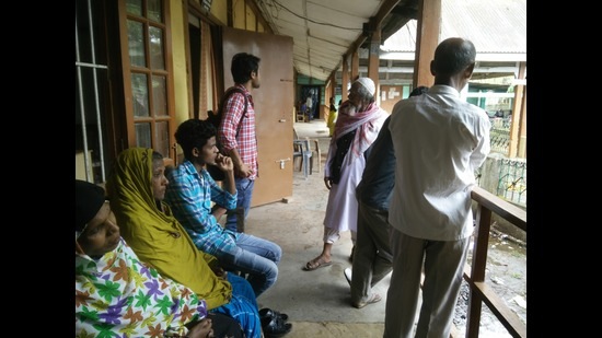 D (doubtful) voters waiting outside the Foreigners Tribunal Office, Goalpara, Assam, 2016 (Hindustan Times)