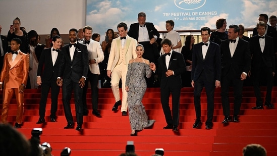 Jennifer Connelly and Tom Cruise leave the Festival Palace following the screening. (AFP)(AFP)