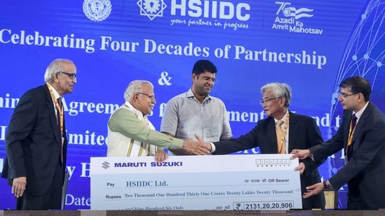 Haryana Chief Minister Manohar Lal and Deputy CM Dushyant Chautala seen with Maruti Suzuki India Chairman RC Bhargava, Maruti Suzuki Managing Director & CEO Kenichi Ayukawa at the signing of an agreement by Maruti Suzuki India Limited, Suzuki Motorcycle India Private Limited and the Haryana State Industrial and Infrastructure Development Corporation Limited (HSIIDC) for the allotment of 800 acres and 100 acres of land at Industrial Model Township (IMT) Kharkhoda, near Sonipat, Haryana Chief Minister Manohar Lal and Deputy CM Dushyant Chautala seen with Maruti Suzuki India Chairman RC Bhargava, Maruti Suzuki Managing Director & CEO Kenichi Ayukawa at the signing of an agreement by Maruti Suzuki India Limited, Suzuki Motorcycle India Private Limited and the Haryana State Industrial and Infrastructure Development Corporation Limited (HSIIDC) for the allotment of 800 acres and 100 acres of land at Industrial Model Township (IMT) Kharkhoda, near Sonipat,
