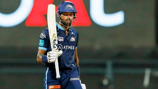 Hardik Pandya of Gujarat Titans raises his bat after scoring fifty against Royal Challengers Bangalore(IPL)