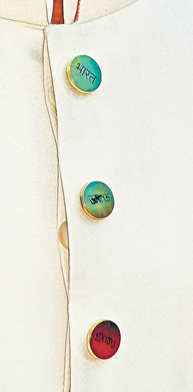 The buttons on the outfit