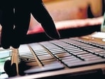 Cyber crime hacker typing on laptop Cyber crime hacker typing on laptop