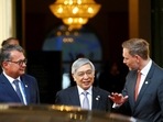Bank of Japan Governor Haruhiko Kuroda poses for a photo with Germany's Finance Minister Christian Lindner and President of the Deutsche Bundesbank Joachim Nagel.