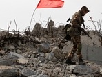 FILE PHOTO: A serviceman of the self-proclaimed Donetsk People’s Republic (DNR) walks at the damaged war memorial complex Savur-Mohyla during a ceremony marking the 75th anniversary of the liberation of the Donbas region from the Nazi occupation during World War Two,