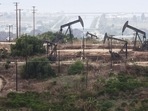 Oil pumpjacks are viewed in the Inglewood Oil Field.(AFP) Oil pumpjacks are viewed in the Inglewood Oil Field.(AFP)