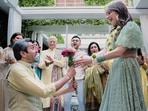 Kanika Kapoor and Gautam during the mehendi ceremony. Kanika Kapoor and Gautam during the mehendi ceremony. 
