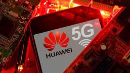 A smartphone with the Huawei and 5G network logo is seen on a PC motherboard in this illustration picture. (REUTERS/ FILE)