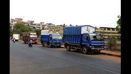 Commercial vehicles parked at residential locality in Ghansoli Sector 9 in Navi Mumbai. A third party research and review was earlier conducted to find solutions for the parking woes that will be used to formulate the parking policy. (BACHCHAN KUMAR/HT PHOTO)