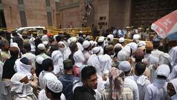 Worshippers on their way to the Gyanvapi mosque in Varanasi on Friday. (PTI PHOTO)