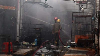 Firefighters try to douse fire that broke out in the godown of a shop, at Jhandewalan Cycle Market, in New Delhi. (Sanjay Sharma) Firefighters try to douse fire that broke out in the godown of a shop, at Jhandewalan Cycle Market, in New Delhi. (Sanjay Sharma)