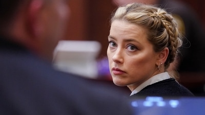 Amber Heard looks on during ex-husband Johnny Depp's defamation trial against her, at Fairfax County Circuit Court in Fairfax, Virginia, US, May 19, 2022. (REUTERS) (REUTERS)